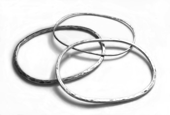 OAK $140, $150, $160-sterling silver bangle bracelet of rounded rectangle with hammered surface and sanded edges (1/16-1/8" thick) OAK $140, $150, $160-sterling silver bangle bracelet of rounded rectangle with hammered surface and sanded edges (1/16-1/8" thick)